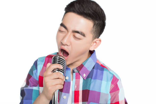 istock young chinese male singer 1385619439