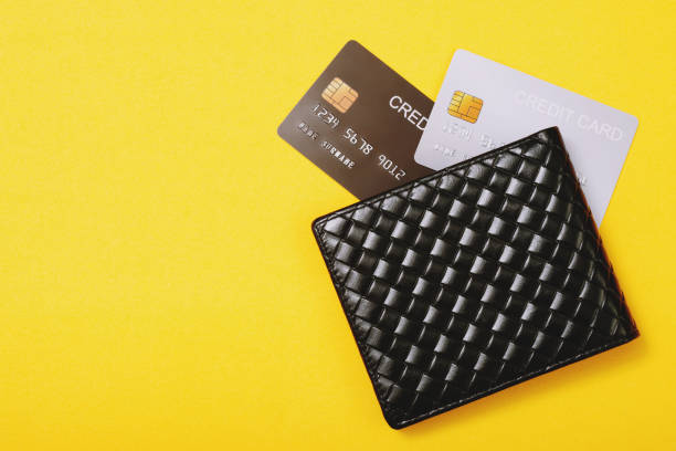 istock close up low key macro shot credit card on a computer keyboard with soft focus for background. finance or online pay money  concept. 1385619529
