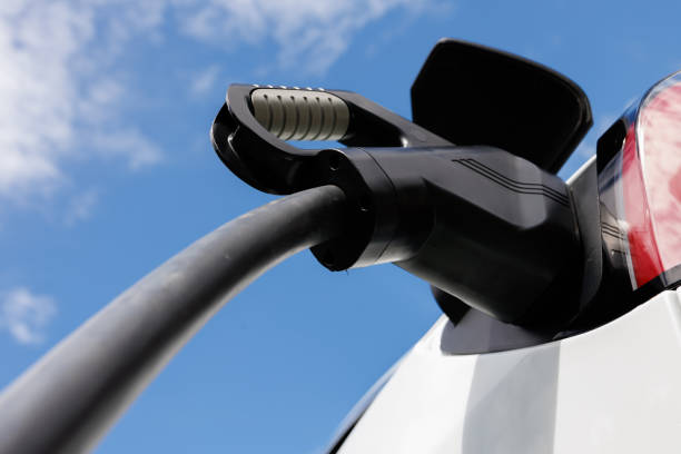 Electric vehicle charging stock photo