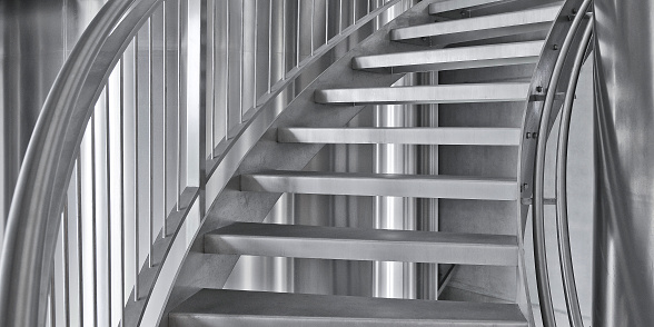Detail of a stainless steel staircase in a modern building
