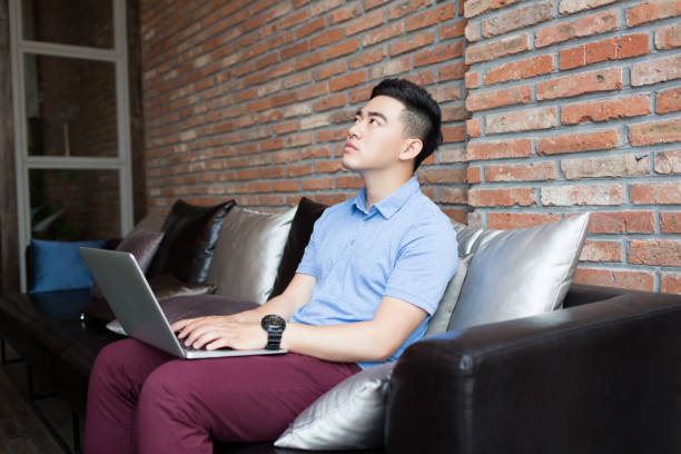 istock young handsome man in coffee shop 1385624648