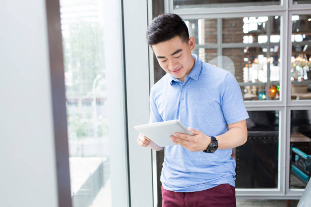 istock man wearing a blue T-shirt 1385625192