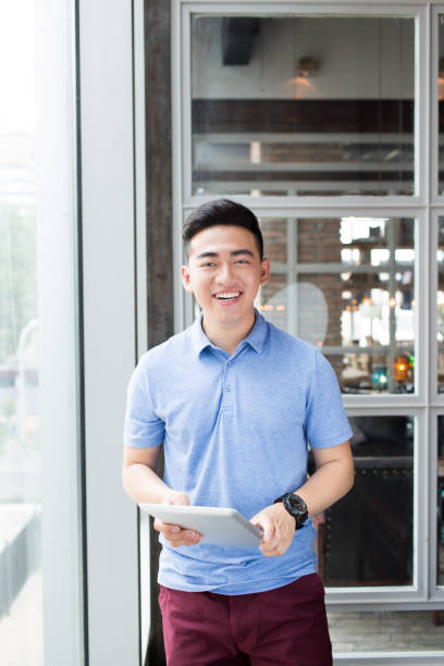 istock man wearing a blue T-shirt 1385625208