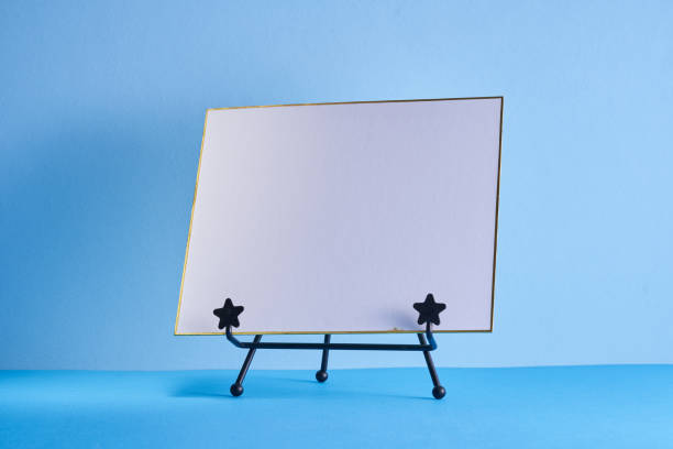 istock blank white card against blue background 1385630233