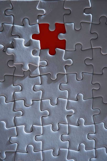 istock Close up of textured white jigsaw puzzle 1385631021