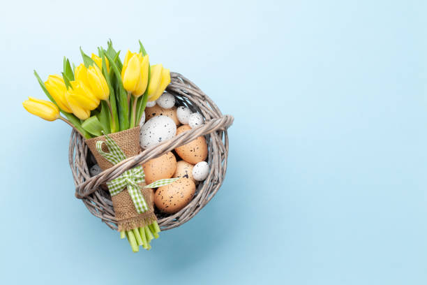 istock Easter greeting card with tulips and eggs 1385640517
