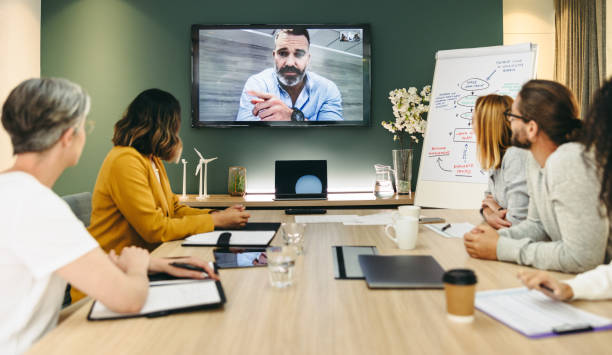 istock Innovative businesspeople having a video conference in a boardroom 1385648113