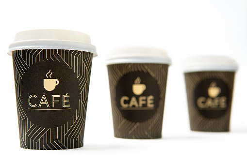 A shot of three coffee glasses lined up perfectly from front to back.