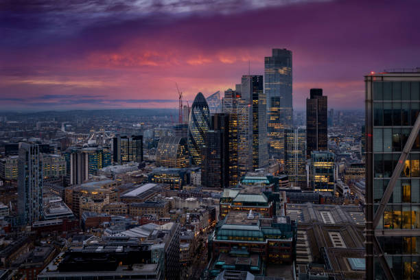 Panoramic view to the illuminated City of London Panoramic view to the illuminated City of London with Tower Bridge and Thames river during evening, England city of london stock pictures, royalty-free photos & images