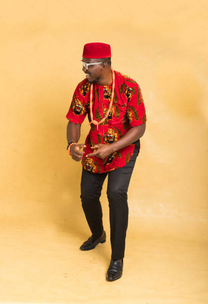 istock Igbo Traditionally Dressed Business Man Happy at a Side Product 1385668011