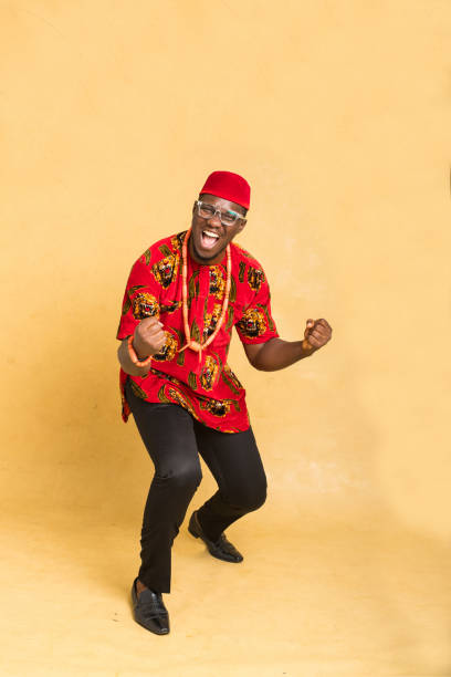 istock Igbo Traditionally Dressed Business Man Celebrating 1385668099