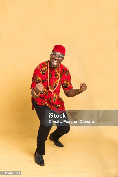 Igbo Traditionally Dressed Business Man Celebrating Stock Photo - Download Image Now