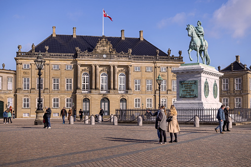 Copenhagen, Denmark - May 14, 2023: Amalienborg Palace, Equestrian Statue Of Frederick V, Amalienborg Palace Change Of Guards, People Walking, Taking Picture During Springtime In Scandinavia Northern Europe