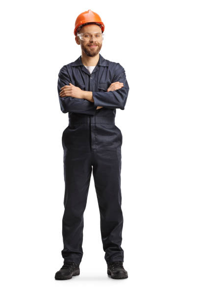 istock Technician in a uniform with a helmet and goggles posing 1385677862