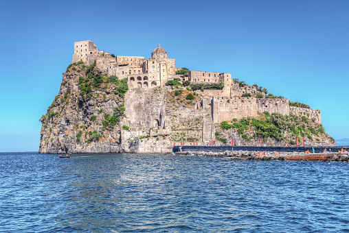 Naples, Ischia, Italy - July  05 2021: the Aragonese castle, an imposing fortress on the island of Ischia
