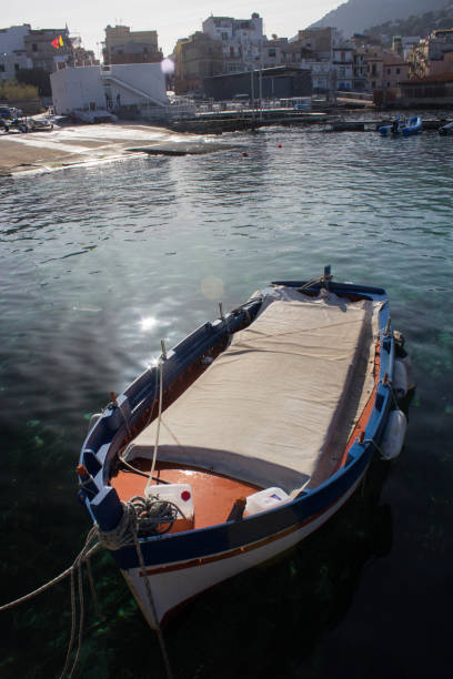 istock fishing boats moored in the harbor 1385679262