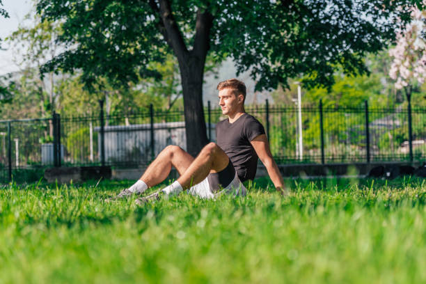 istock Athletic sportsman taking a break from a workout in the park 1385680428