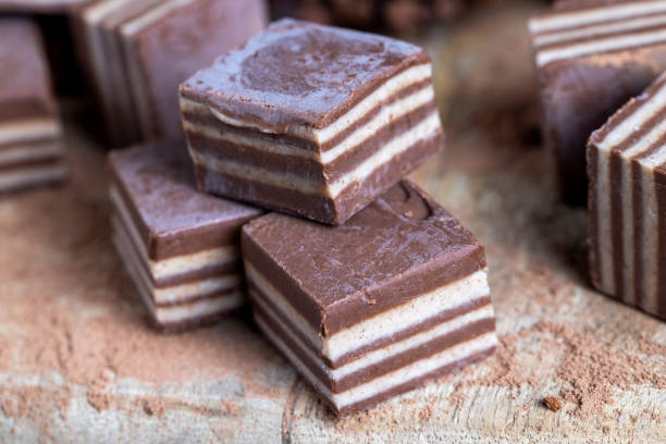 istock multi-layered sweets made of cream and chocolate layers 1385683225