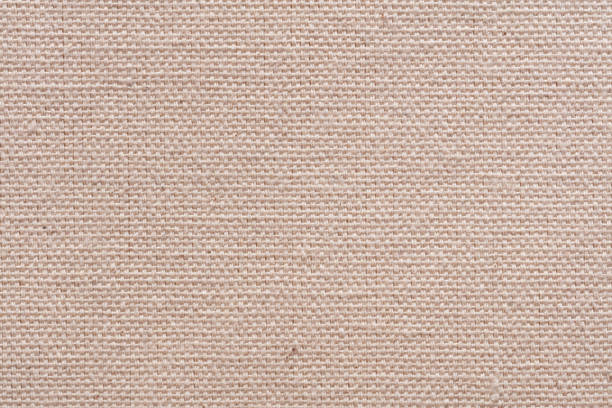 istock Light beige coton canvas background as part of your design work. 1385683322