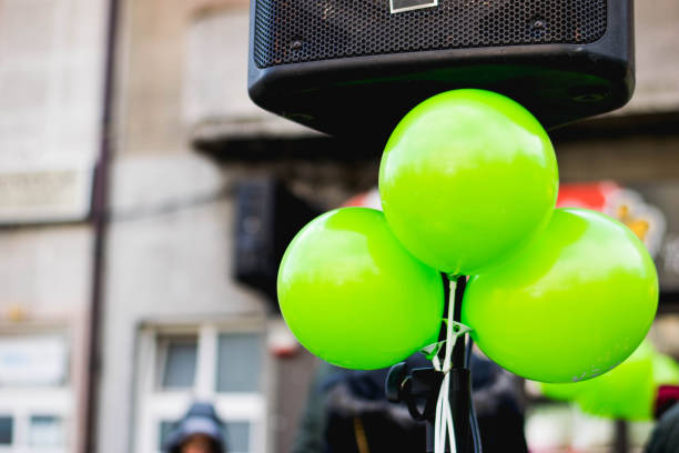 03/23/2019 - Balloon vendor man walking in the streets of Alsancak district in the afternoon. Izmir, Turkey.
