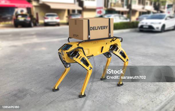 A Robot Dog Is On The Way To Deliver Goods Stock Photo - Download Image Now - Robot, Dog, Delivering
