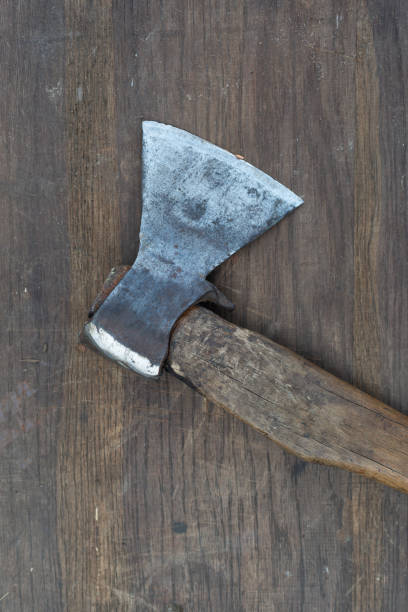 istock An old ax for wood chopping on a table 1385697556