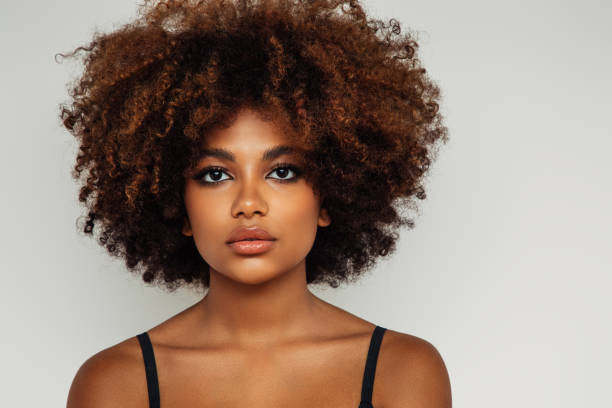 istock Beautiful emotional afro woman with perfect make-up 1385698295
