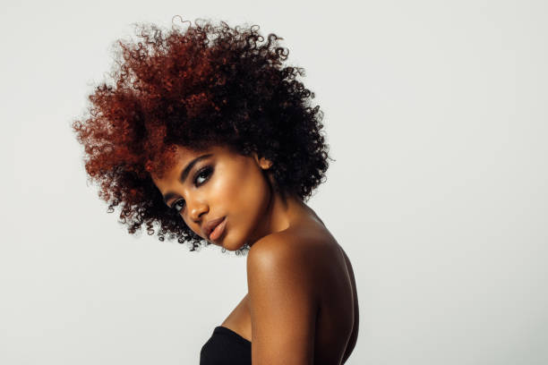 istock Beautiful afro woman with perfect make-up 1385698780