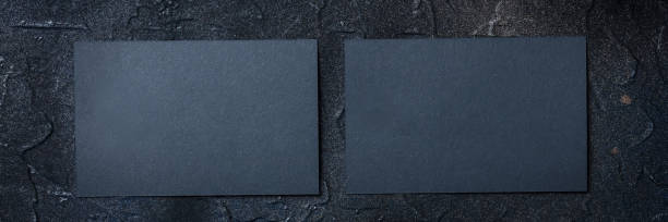 istock Black business card mockup panoramic banner on a dark background 1385698837
