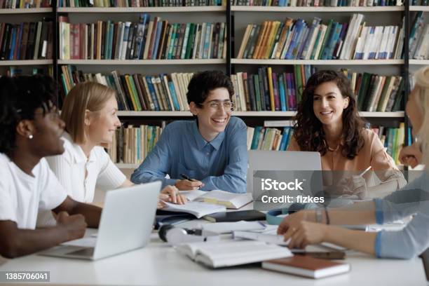 Happy Group Of Diverse Multiracial Students Studying At Library Stock Photo - Download Image Now