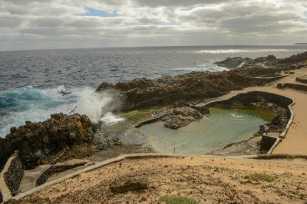 Natural swimming pool of Charco del Palo at Lanzarote on Canary islands, Spain stock photo