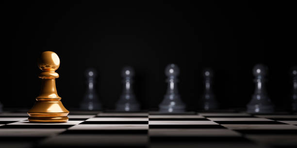 istock Golden pawn chess encounter with black pawn chess enemy on dark background for strategy idea and futuristic concept 1385706415
