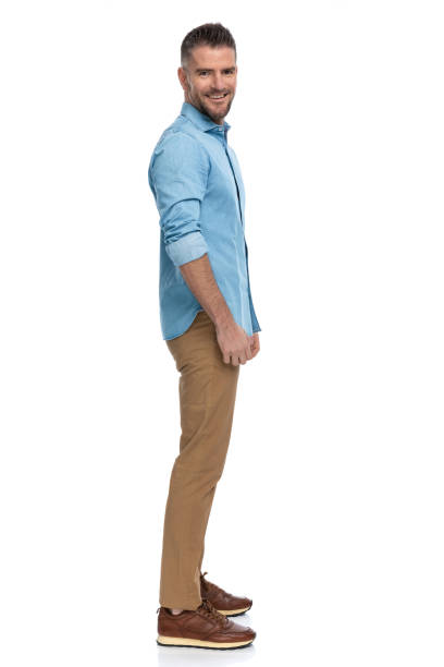 istock side view of happy grizzled bearded man smiling while standing in line 1385708356