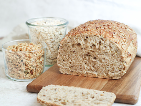Whole-wheat cereal low carb bread with granola and oatmeal, a ketogenic diet and weight loss concept