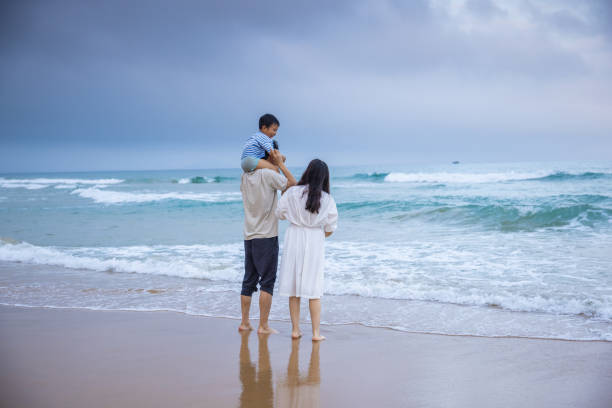 Family having fun on sea beach
