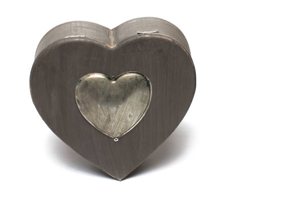 istock Closeup wooden box shape heart white background 1385717411