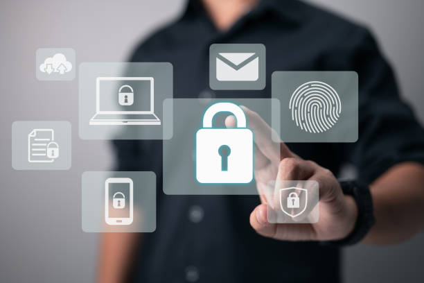 istock Businessman touch a padlock. Concept of internet network security 1385719831