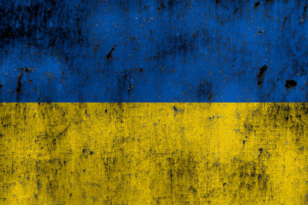 istock ukrainian flag painted over rusty metal 1385720422