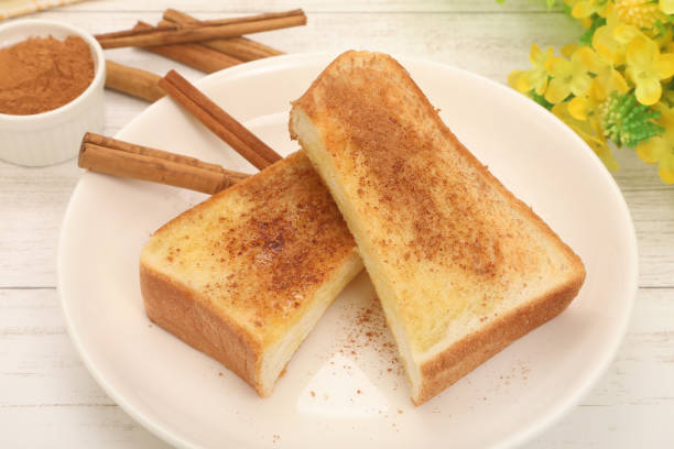 istock Baked bread sprinkled with cinnamon powder 1385720654