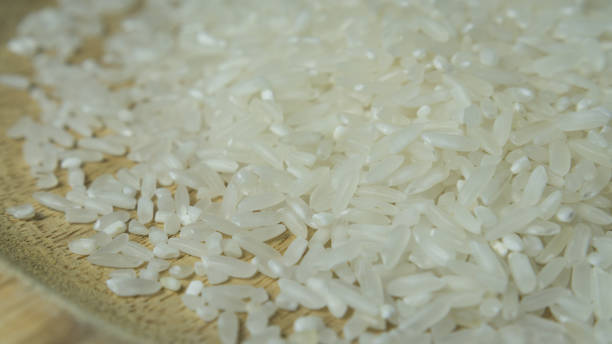 istock Background texture of a close-up of a white rice grain called 