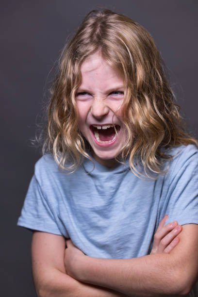 istock Long haired boy of 9 1385722779