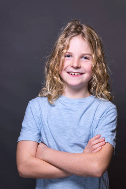 Boy Long Hair Stock Photos, Pictures & Royalty-Free Images - iStock