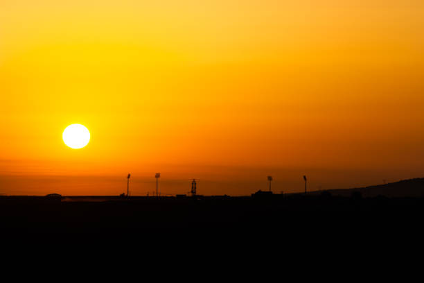 istock sunset in the city 1385725395