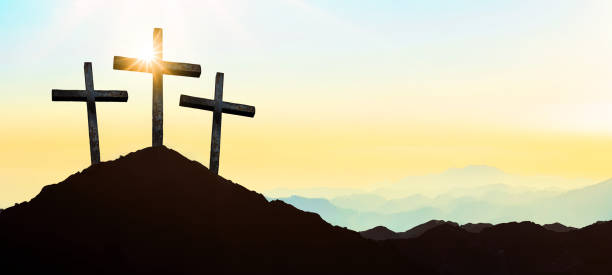 istock Easter background banner panorama religious greeting card Crucifixion and Resurrection. Three crosses of Golgotha by sunset.