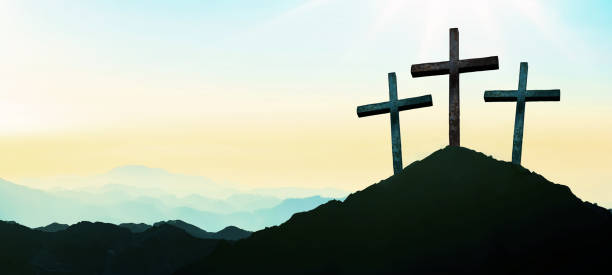 istock Easter background banner panorama religious greeting card Crucifixion and Resurrection. Three crosses of Golgotha by sunset.