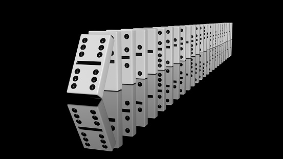 3D - rendering - white dominoes lined up in a row on a black background with reflection.