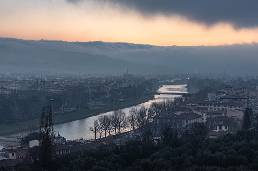 Florence, Italy - January 05, 2020: River Arno early January morning during sunrise in Florence
