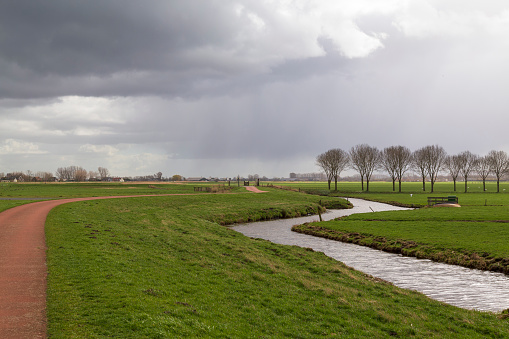Flat Dutch landscape near the village of Eemnes in the Netherlands.