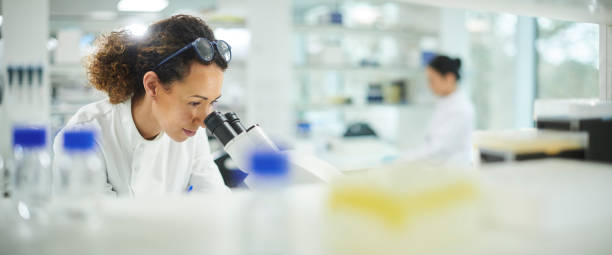 istock female biochemist in the lab 1385731502