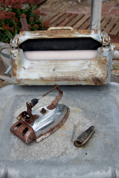 istock Old washing machine and iron close up 1385731871